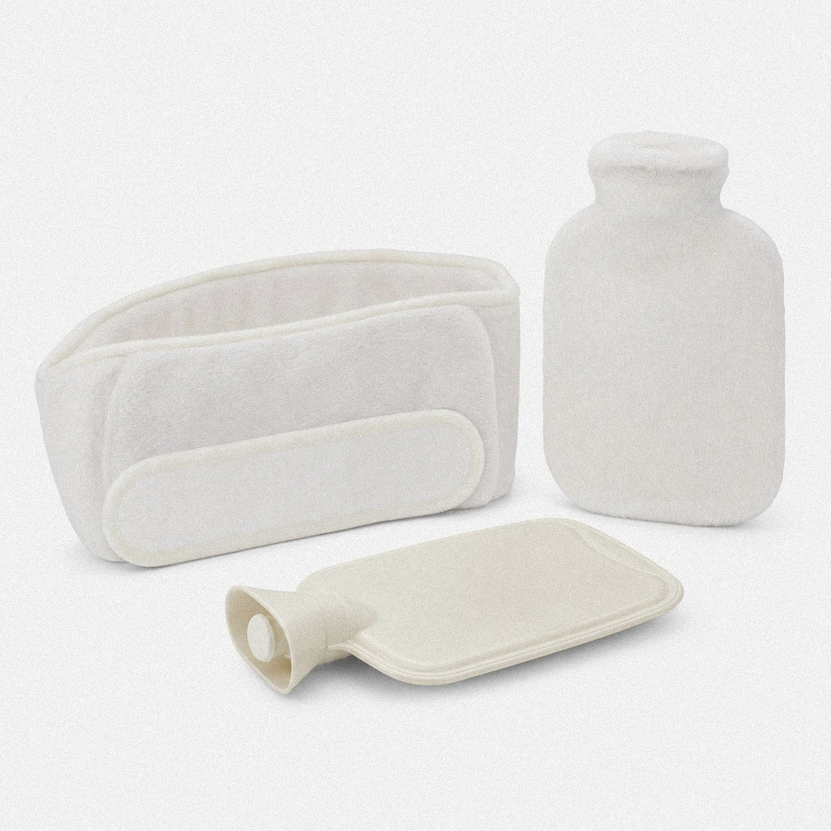 Bolsa de agua caliente OMNIA con funda de peluche y faja para la cintura